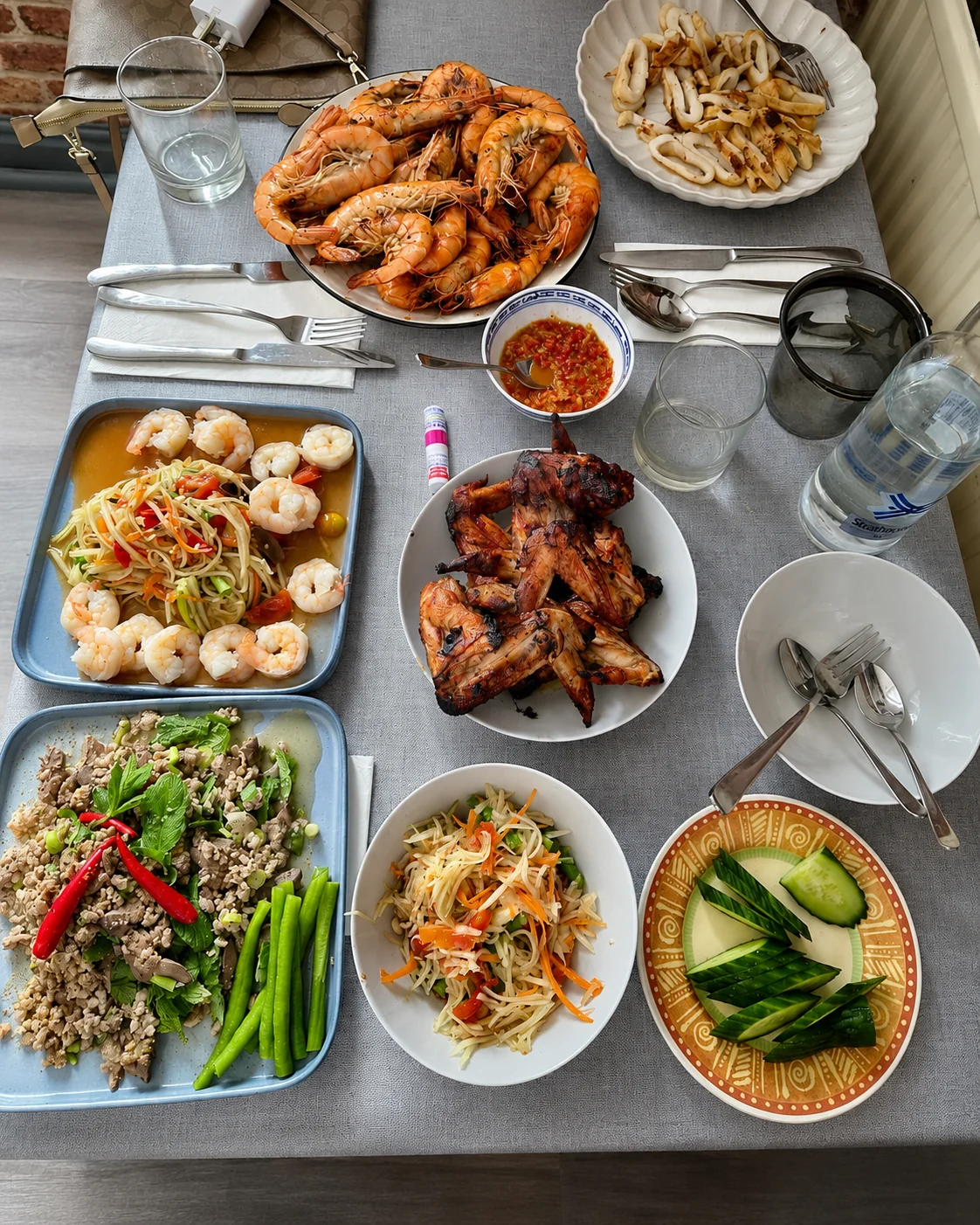 Thai feast with grilled prawns, som tum and larb at Tawan Chay