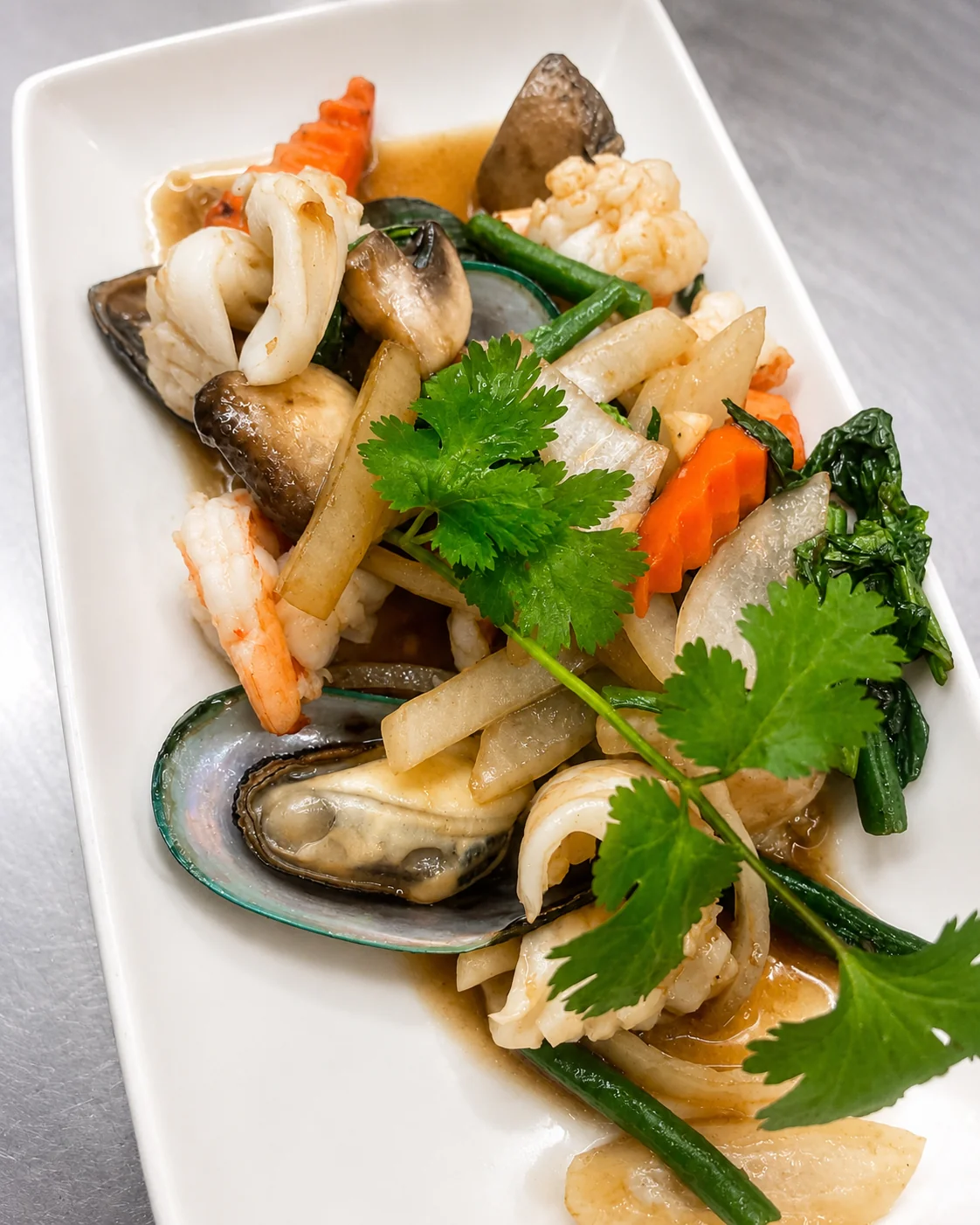 Thai seafood stir-fry with mussels and prawns at Tawan Chay