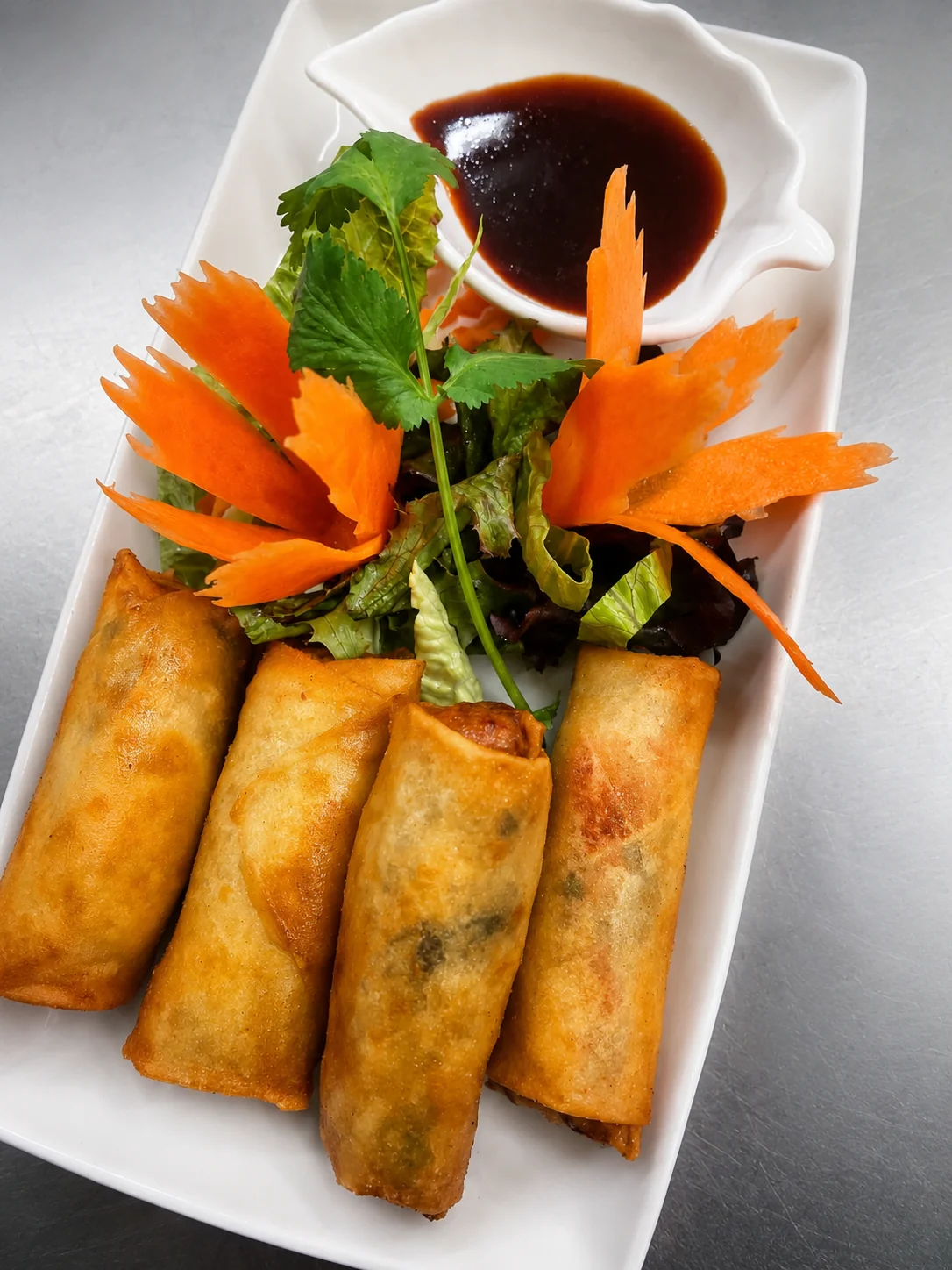 Crispy Thai spring rolls with hoisin dipping sauce