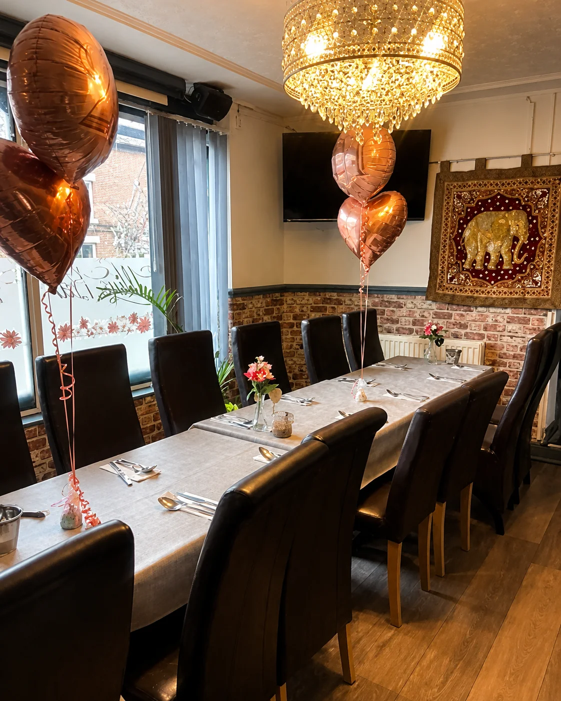 Long dining table set for a celebration at Tawan Chay